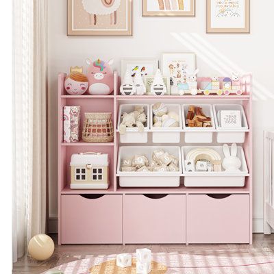 This bookcase is compact and provides a variety of storage options for children. There are 3 compartments on the left side, suitable for storing and displaying books and toys, and 6 storage bins on the right side provide classified storage space for toys, dolls, etc. The bottom is equipped with a sliding storage drawer, making storage more fun and easier! | Latitude Run® Bookcase w/ toys Organizer, 3 Removable Drawers Brown 42.1 x 47.2 x 11.8 in, Wood | C110872164 | Wayfair Canada Ikea Shelves Kids Bedroom, Playroom Bookshelves Ikea, Ikea Toddler Book Shelf, Playroom Storage Shelf, Ikea Toy And Book Storage, Ikea Kid Bookshelf, Ikea Bookshelf Children, Storage For Kids Playroom, Shelves With Baskets For Storage Nursery