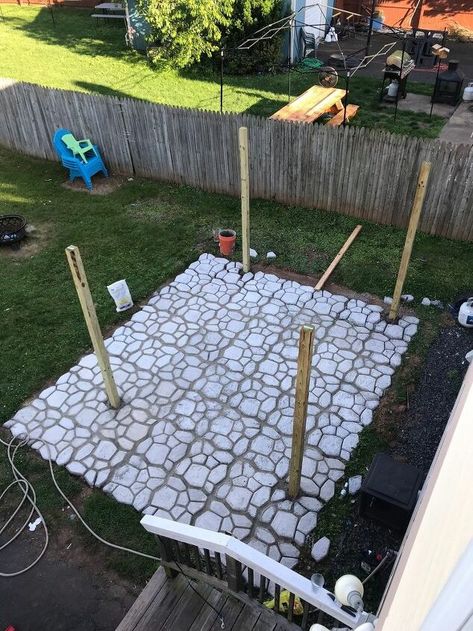 This is a concrete patio made with individual diy pavers using the walkmaker concrete molds. Hey all, If you want a patio on a budget, do this. We spent a less than $250 on this 18x14 space. We invited two of our neighbors over for dinner and surprised them with shovels to help us dig 😂.. jk. Kinda! After all the digging, we killed the weeds and grass.. I did some research on the Walkmaker molds and read that they required little preparation. If I learned something from thi… Concrete Patio Molds, Diy Pavers, Patio On A Budget, Diy Concrete Patio, Pavers Diy, Concrete Patios, Pool Landscape, Garden Shelves, Flagstone Patio