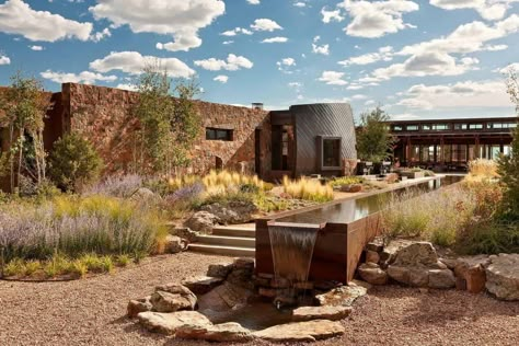 Eco-friendly desert retreat nestled into a hillside overlooking Santa Fe Desert Home Exterior, Southwestern Landscape, Santa Fe Home, Rustic Exterior, Boutique Resort, Desert Homes, Desert Landscape, Water Feature, Southwestern Style