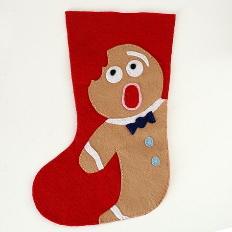 Looking for a funny Christmas stocking pattern? Check out this majorly distressed gingerbread man, missing a bite from his head. Free pattern! Diy Stockings, Felt Christmas Stockings, Stocking Designs, Christmas Stockings Diy, Felt Stocking, Christmas Stocking Pattern, Stocking Pattern, Xmas Stockings, Felt Christmas Ornaments