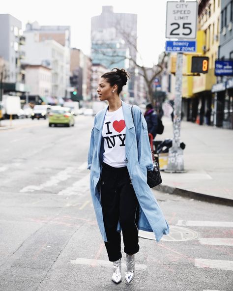 Claire Leana Millar wearing a TopShop Light blue Trench coat, Adidas track pants, TopShop Silver Boots, and an I love New York Tee Shirt Light Blue Trench Coat Outfit, Light Blue Trench Coat, Metallic Ankle Boots, I Love New York, Penn Station, Saint Laurent Vintage, Vintage Chanel Bag, Trench Coat Outfit, Blue Trench Coat