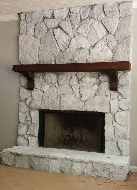 Updating the Fireplace Romabio Nube Gray Fireplace, Grey Brick Fireplace Makeover, Concrete Wash Fireplace, Wall Next To Fireplace Decorating, 70s Rock Fireplace Makeover, Can You Paint Stone Fireplace, How To Decorate A Rock Fireplace, Natural Rock Fireplace, Painting Over Stone Fireplace