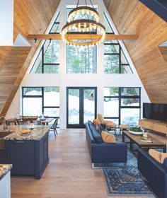 At Home in an A-Frame - Mountain Living A Frame House Interior, A-frame Interior, A Frame Cabins, Classic White Kitchen, A Frame House Plans, Interior Minimalista, Phoenix Rising, A Frame Cabin, Rustic Contemporary