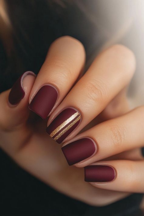 Fall in love with your nails all over again with these 58 gorgeous designs. From matte finishes to metallic accents, find your perfect fall look. Tap the link for more fall nail inspiration! Winter Fall Nail Designs, Burgundy Accent Nails, November Nails Maroon, Gloss And Matte Nails, Matte Burgundy Nails Short, November Nails Fall Matte, Maroon Nails Design Short, Silver Fall Nails, Burgundy Matte Nails Design