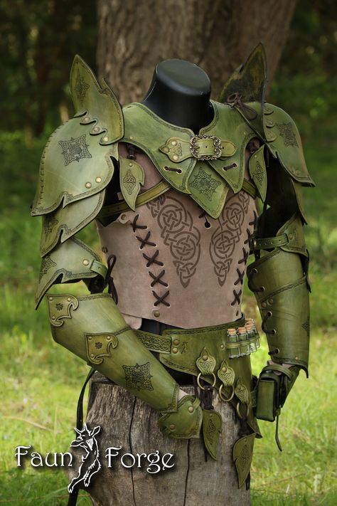 Green Leather Costume Set  www.Faun-Forge.com Set contains: -Gorget + two Pauldrons with wings -Alchemy belt -Pair of bracers with paws -Set of leafy hangers -Vest Optional items -Bandolier -Bandolier+backscabbard You can ask for custom vest ornaments, no real limitation there. www.faun-forge.com Pauldrons has position adjustment, to front and rear. And are assembled to the removeable gorget. Shoulders consist of four moveable parts giving you more freedom moveing arms to the front and up. Set h Green Leather Armor, D&d Costumes, Buck Skin Clothing, Dnd Leather Armor Female Druid, Clothes For Wings, Male Rennisance Faire Costumes, Druid Ren Faire, Fairy Larp Costume, Forest Fae Costume