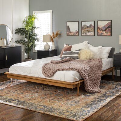 Create a transitional statement in your bedroom with this distressed bed. The horizontal plank leveling on the headboard adds an interesting look to the bed for a stylish addition to your room. Have a good night’s sleep knowing you’ll be sleeping in style. | Mercury Row® Henline King Solid Wood Low Profile Platform Bed Wood in Brown, Size 81.25 W x 82.75 D in | Wayfair Living Colors, Low Profile Platform Bed, Future Bedroom, Spindle Bed, Seaside House, House Vibes, King Platform Bed, Solid Wood Platform Bed, Regal Design