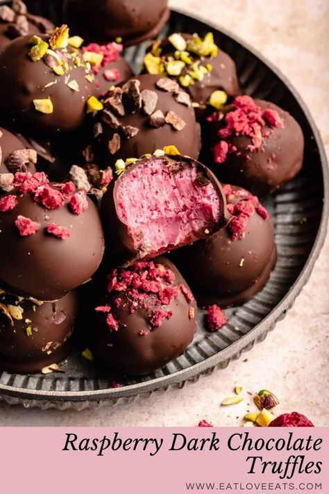 These raspberry dark chocolate truffles are super easy to make and are wonderfully vibrant. The raspberry white chocolate ganache centre is sweet and tangy which perfectly matches the crisp dark chocolate on the outside. These chocolate truffles make for the perfect Valentine's day gift or treat to enjoy after your meal. They store well too so you can make them ahead of time. | eatloveeats.com Raspberry Dark Chocolate, Dark Chocolate Truffles, Freeze Dried Raspberries, Molten Chocolate, Dried Raspberries, Valentines Day Desserts, White Chocolate Raspberry, Love Eat, Chocolate Raspberry