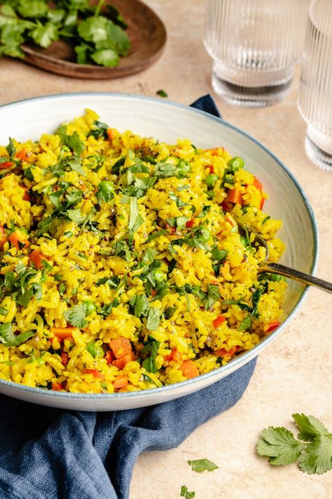 Tumeric Rice Recipe, Garlic Turmeric Rice, Tumeric Rice, Ambitious Kitchen Recipes, Turmeric Rice, Colorful Veggies, Ambitious Kitchen, Vegetable Rice, Turmeric Benefits