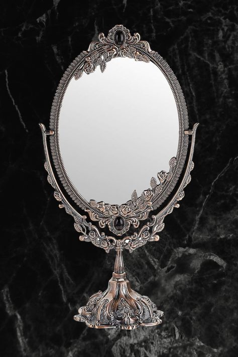 Embrace Gothic allure with the SUMTREE Vintage Mirror. Its ornate, darkly elegant frame conceals a double-sided gem for impeccable grooming. An essential for your gothic abode, this mirror's adjustable, macabre beauty beckons in every room. #affiliatelink Gothic Mirror Frame, Diy Gothic Decor Crafts, Dressing Room Table, Gothic Mirror, Mirror Oval, Mirror Vintage, Goth Home, Goth Home Decor, Ornate Mirror