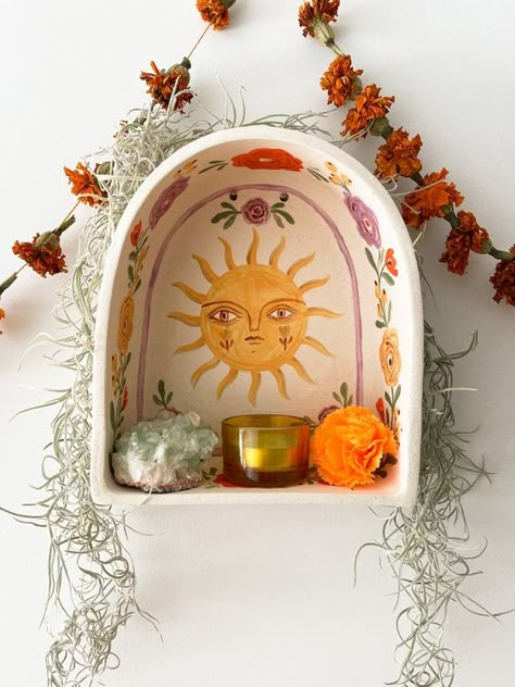 Beauty Break: 06.16.23 | happy buddha breathing Air Dry Clay Light Switch Cover, Paper Mache Shrine, Ceramic Wall Altar, Ceramic Altar Ideas, Hand Building Pottery Ideas Simple, Painted Ceramics Ideas, Sun Altar, Cermanic Ideas, Shrines And Altars Ideas