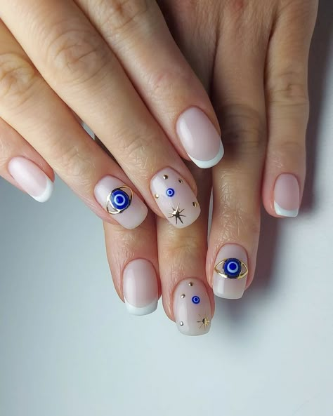 Discover 22 captivating Evil Eye nail designs! Dive into this trending nail art and learn how to DIY for a touch of mystique and style. Unveil your inner enchantress! Click the article link for more photos and inspiration like this // Photo Credit: Instagram @jark.nails // #acrylicnails #acrylicnailsstyles #bestnailstyles #elegantnails #evileyemanicure #evileyenail #evileyenaildesigns #evileyenailideas Evil Eye Manicure Short Nails, Evil Eye Nails Design Short, Evil Eye Short Nail Designs, Spiritual Nails Designs Short, Evil Eye Square Nails, Hamsa Nail Art, Greek Eye Nail Art, Evil Eye Nail Art Design, Evil Eye Acrylics