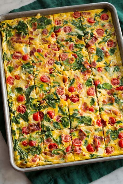 Easy Sheet Pan Eggs are oven baked eggs made with a variety of mix-ins of choice including cheese, meat, and vegetables. They're great for breakfast sandwiches and make ahead breakfast. Muffin Pan Eggs Recipes, Pre Cooked Breakfast Ideas, Sheet Pan Egg Recipes, Vegetable Egg Bake Casserole, Egg Casseroles For Breakfast, Fluffy Sheet Pan Eggs, Egg White Sheet Pan Eggs, Sheet Pan Breakfast Casserole, Make Ahead Egg Sandwiches