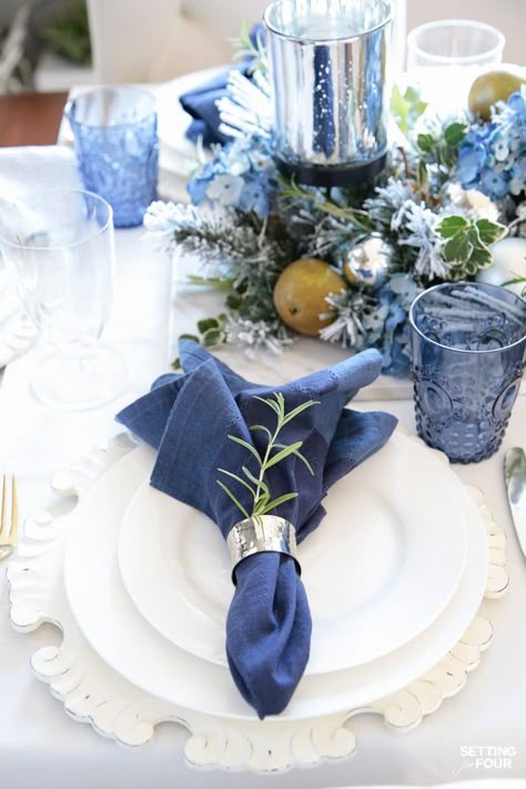 Learn how to create these elegant fall table settings with a blue and white color palette using white dishes, blue and white chinoiserie bowls, navy napkins, sparkly mercury glass and a transitional holiday centerpiece accented with fall herbs, garden greenery and orchard pears. Table Settings Blue, Fall Herbs, Navy Napkins, Blue Table Decorations, Blue Table Settings, Summer Table Decorations, Summer Table Settings, Herbs Garden, Blue Christmas Decor