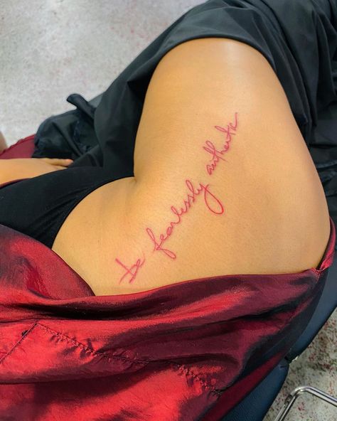 Celebrity Tattoo Artist on Instagram: “Side Script x Maroon Colored Ink” Red Side Tattoo, Side Tattoo Women, Women Side Tattoos, Cute Side Tattoos, Red Tattoo On Black Women, Cute Thigh Tattoos Women, Red Tattoos For Women, Maroon Tattoo, Tattoo Ideas Red