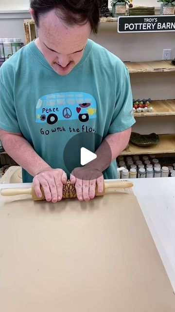 Troy Drake on Instagram: "Thank you @msfancypantslasercutting for sending these rolling pins to Troy all the way from Australia. They’re beautiful! Rolling pin - a gift from @msfancypantslasercutting T-shirt - purchased from @candidlykind A business owned by Grace, a young woman with Down syndrome Glaze used - @amacobrent PC-26 Blue Lagoon x3 cone 5 #pottery #troymadeit #potterystudio #ceramics #handbuiltpottery #ceramicstudio #t21 #handmadepottery #artistwithdownsyndrome #potterylove #potterswithdownsyndrome #ceramiclife #downsyndrome #downsyndromeawareness #theluckyfew #trisomy21 #downsyndrome #handbuilt #clay #art #handbuiltpottery #ceramicdish #amacoglaze #msfancypantslasercutting" Amaco Glazes, Beginner Pottery, Pottery Videos, Clay Bowl, Clay Pot Crafts, Rolling Pins, Surface Decoration, Hand Built Pottery, Blue Pottery