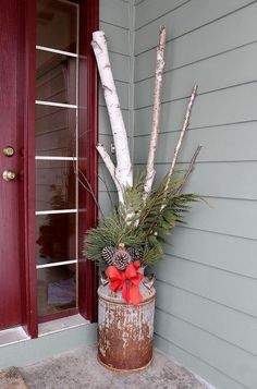 winter floral arrangements, christmas decorations, porches, seasonal holiday decor Christmas Decor Milk Can, Milk Can Christmas Decor, Milk Can Ideas Front Porches, Winter Porch Decorations, Natal Country, Milk Can Decor, Birch Tree Decor, Old Milk Cans, Winter Floral Arrangements