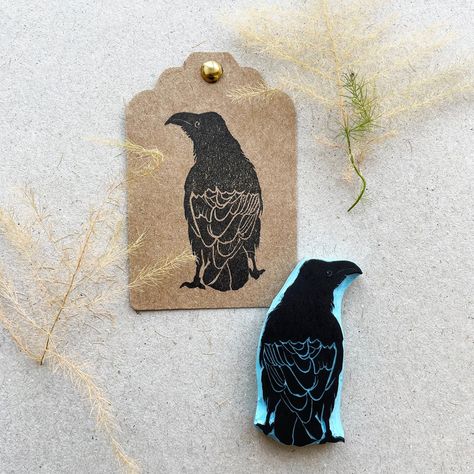 "Hand carved rubber stamp of a black crow (Raven) Perfect to stamp on notebooks, fabric, tags, journals and more. It gives a spooky or nostalgic feeling to your project. - Size: 2\" (5cm) tall - Hand carved rubber stamp - Choose to have wood base, unmounted (just the rubber) or get a protecting box with it (perfect for gifts) - Care: wipe ink off with baby wipes You might also like this other raven stamp: https://www.etsy.com/listing/1532742889 Happy stamping Cassandra" Crow Pumpkin Carving, Woodcut Crow Tattoo, Crow Stamp, Raven Woodcut, Crow Trinkets, Raven Lino Print, Raven Images, Hand Carved Rubber, Crow Bird