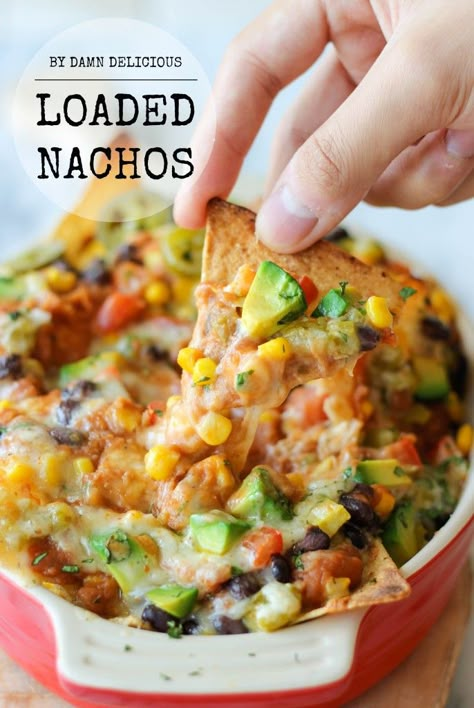 Loaded Nachos -  Loaded with both refried and black beans, you definitely won't be missing the meat in these cheesy, vegetarian nachos! Vegetarian Nachos, Frijoles Refritos, Loaded Nachos, Appetizers And Dips, Football Food, Recipes Appetizers, Snacks Appetizers, Meatless Meals, Vegetarian Meals