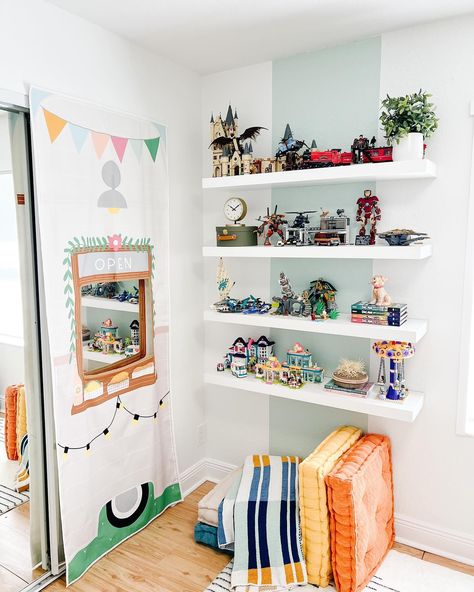 Playroom to Workspace: A Space for Busy Parents! @swinglytoys creator and mom of two needed a shared space for work and play! From productive meetings to creative playdates, this revamped space was designed to keep up with their busy lifestyle. Discover the perfect balance between business and family fun! #WorkPlayHaven #playroom #multipurposeroom #homeoffice #handpaintedmural #explosionofcolors #instaroom #busyparents #wellington #readytoplay #interiordesignkids Kids Lego Display, Study Room Kids, Walker House, Safari Room, Kids Interior Design, Lego Display, Display Area, Multipurpose Room, Home Vibes