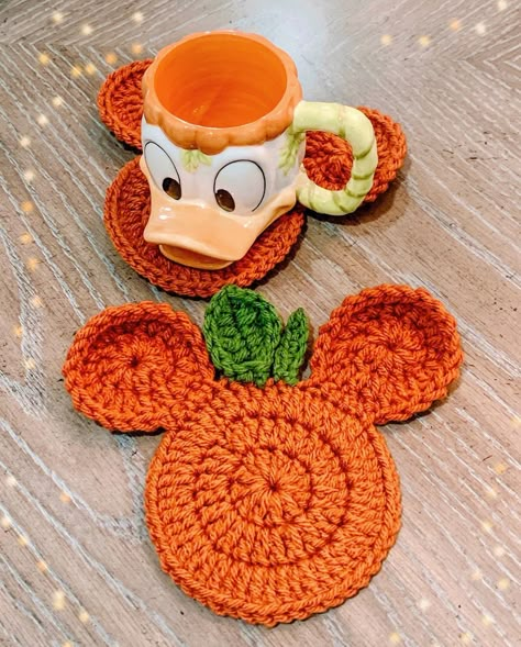 Mickey Mouse Coasters Crochet, Mickey Mouse Pumpkin Crochet, Crochet Minnie Mouse Pumpkin, Disney Halloween Crochet Patterns, Crochet Mickey Mouse Pumpkin, Crochet Mickey Mouse Pumpkin Pattern, Crochet Mickey Mouse Pumpkin Pattern Free, Crochet Pumpkin Placemat, Disney Halloween Crochet