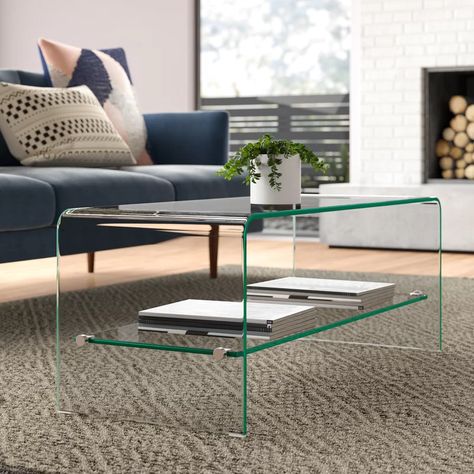 Wade Logan® Selsey TV Stand for TVs up to 43" & Reviews | Wayfair Glass Tv Console, Oval Glass Coffee Table, Floating Tv Stand, Coffee Room, Glass Furniture, Tv Stands And Entertainment Centers, Modern Tv Stand, Coffee Table Wayfair, Tv Console