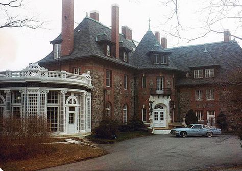 "Petrick mansion"  This Chateauesque mansion was built in Tuxedo Park, New York by architect Whitney Warren for the French-American banker Henry Whitney Munroe in the late 1890's. Originally called Crow's Nest, it became Lindley Hall when purchased by the Lindley family in 1926. It is filled with French influences, particularly Art Nouveau railings and carvings and carved walnut panelling. From: Big Old Houses: As Good As It Gets | New York Social Diary Tuxedo Park New York, 60s Mansion, 1960s Mansion, Old Hollywood Mansion, 1890s House, New York Mansion, Hollywood Mansion, 60s House, Nyc House