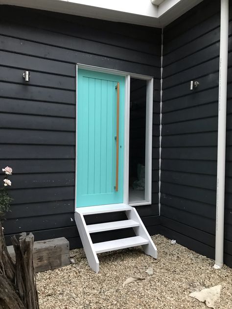 Black House With Colored Door, Teal Door Colors, Neon Front Door, Dark House Bright Door, Black House Bright Door, Dark Teal Doors Front Entrance, Black House Colorful Door, Black House Exterior Bright Door, White House Teal Door