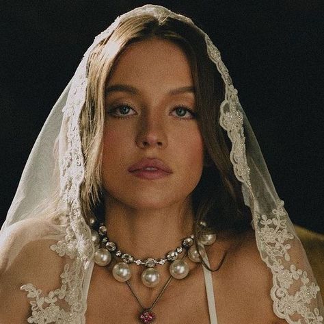 NYC Jewelry Week on Instagram: "@sydney_sweeney making a case for jewelry while “swimming” or proving the most important part of your bridal look is jewelry. Via @frankiesbikinis . . . #sydneyxfrankies #bridaljewelry #alternativebridal #weddingpearls #pearls #crossjewelry #sydneysweeney #euphoria#whitelotus" Stealing Beauty, Helmut Newton, Slim Aarons, Sydney Sweeney, Liv Tyler, Bridal Photoshoot, Frankies Bikinis, Weird Stuff, Monica Bellucci