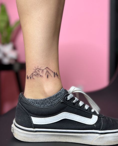 Fineline mountain tattoo Mountain Name Tattoo, Mountain Line Work Tattoo, Spine Tattoos Mountains, Mountain Tattoo With Trees, Ankle Mountain Tattoo, Mountain Tattoo Ankle, Mountain Tattoo Leg, Fineline Mountain Tattoo, Tattoo Montagne