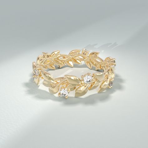 Embrace the beauty of nature with the Diamond Ivy Ring, a stunning piece of jewelry that exudes elegance and charm. Crafted in 14k 18k 10k solid gold with meticulous attention to detail, this ring is designed to captivate with its leafy vine-inspired design. The ring can be made with yellow, rose, or white gold, please choose your size from the dropdown menu options above. 𝐑𝐢𝐧𝐠 𝐃𝐞𝐭𝐚𝐢𝐥𝐬: ❥ Solid gold, available in 10, 14 & 18 karats. ❥ Gold Color Options: White Gold, Yellow Gold, Rose Gold ❥ Band Width: 4.40 mm ❥ Thickness: 2.10 mm ❥ Gemstone: Genuine White Diamond ❥ Gem Color and Clarity: G Colour SI Clarity ❥ Total CTW: 0.325 ctw 𝐂𝐮𝐬𝐭𝐨𝐦𝐢𝐳𝐚𝐭𝐢𝐨𝐧: We would be delighted to accommodate any customization requirements you have, simply get in touch and let us know what you Gold Leaf Wedding Band, Ivy Ring, Vine Wedding Ring, Thick Band Ring, Leaf Wedding Band, Botanical Ring, Rose Gold Band, Pink Jewelry, Pretty Wedding