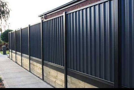 According to the suppliers of Colorbond fence extensions, the first tip is that you should keep in mind as to how it will go with your home. Concrete Sleeper Retaining Walls, Colorbond Fence, Retaining Wall Fence, Sleeper Retaining Wall, Cypress House, Retaining Wall Steps, Fencing And Gates, Concrete Sleepers, Glass Pool Fencing