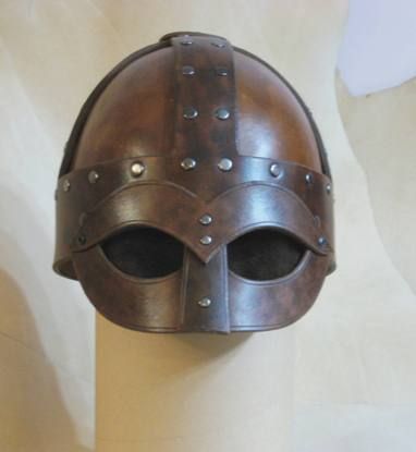 Ohhh I plan on making one of these for my studio tickle trunk Leather Helmet Medieval, Leather Helmet Pattern, Leather Helmet, Sca Armor, Viking Cosplay, Viking Armor, Helmet Armor, Leather Working Patterns, Armor Clothing