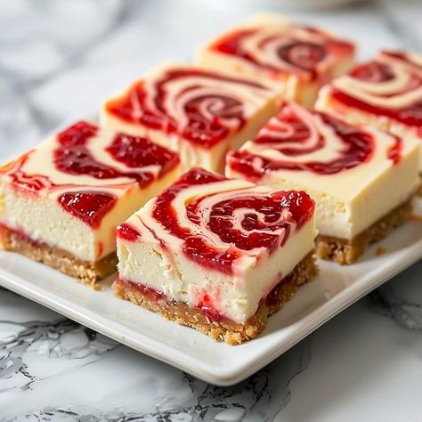 Dessert doesn't get better than these easy strawberry cheesecake bars. They're everything you love in the classic dish, only served in convenient squares. Cheesecake Bars For A Crowd, Cheesecake Squares No Bake, Cheesecake Squares Recipes Easy, Strawberry Cheesecake Squares, Strawberry Cheesecake Bars 9x13, Strawberry Cheesecake Bars Easy, Cheesecake Bars Recipes 9x13, Cheesecake Squares Recipes, 9x13 Cheesecake Recipes