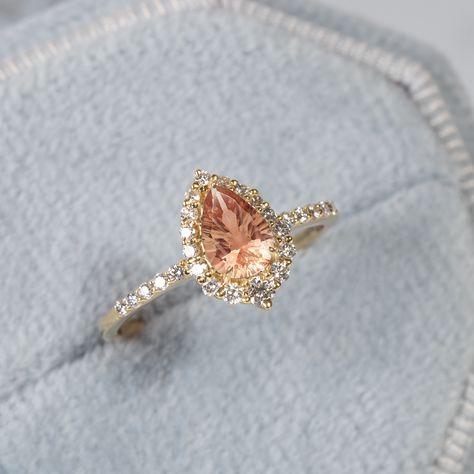 "Sunstone Engagement Ring/14k Gold Sunstone Ring/Teardrop Sunstone Halo Diamond Ring/Wedding Ring/Unique Gift/Bridal Promise Ring/Dainty Ring ★ ★ ★ ★ CUSTOM/DUTY-FREE SHIPPING WORLDWIDE, BUYERS DON'T HAVE TO PAY ANY CUSTOM FEES WHILE IMPORTING ★ ★ ★ ★ Details Made to order Material: 14k/18k gold Color Options: Yellow Gold, White Gold, Rose Gold ★ Center Stone Sunstone, Pear Size: 5 x 7 mm Approx Weight (Ct): 0.61 ★ Accent Stones Diamond Round Size: 1.2 mm * 19 Nos., 1.3 mm * 2 Nos.,1.4 mm * 2 No Oregon Sunstone Engagement Ring, Sunstone Rings, Amber Engagement Ring, Sunstone Engagement Ring, Engagement Ring With Halo, Sunstone Ring, Ring Teardrop, Oregon Sunstone, Diamond Ring Wedding