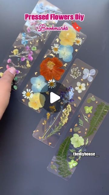 "Cᵣₐfₜ ᵢₙdₑₑd" on Instagram: "Hey Everyone, What do u think about these fabulous bookmarks made out of Pressed Flowers! 
We can use them in copies, books or diaries! 
They look super cute!! And this tutorial is so easy to make. 
You just need some pretty flowers....!! 🌸🌼
Try this today! 
Don't forget to follow my page for more interesting videos and DIY'S AND CREATIVITY.
.
.
.
.#trending #art #artist #artistsoninstagram #trendingnow #diycrafts #craftastherapy #diyprojects #creator #trendy #craft #post #explorepage✨ #explorepage #explorar #likesforlike #reelkarofeelkaro #fypage #fypシ #fy #trendy #pressedflowerart #pressedflowers #diygame #diwalidecorations #diyhomedecor #diyideas #tutorials #tutorial" Pressed Flower Bookmark Diy, Flower Bookmark Diy, Trendy Bookmarks, Pressed Flower Bookmark, Pressed Flowers Diy, Bookmark Diy, Interesting Videos, Flower Bookmark, Trending Art