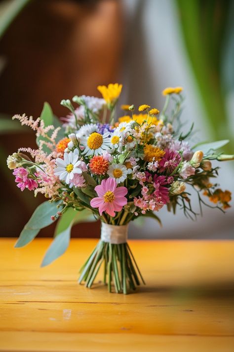 Planning a rustic wedding? These 25 mini wildflower bouquets are the perfect choice. Petite and charming, they bring natural elegance to any bridal look. Check them out now! #rusticbride #wildflowerbeauty #weddinginspo Spring Wildflower Boutonniere, Wild Flower Spring Wedding, Spring Wild Flowers Wedding, Wildflower Boutineer Ideas, White Wildflowers Wedding, Wildflower Bridesmaids Bouquet, Dainty Wedding Bouquet, Simple Wildflower Wedding Bouquet, Wildflower Wedding Theme Receptions