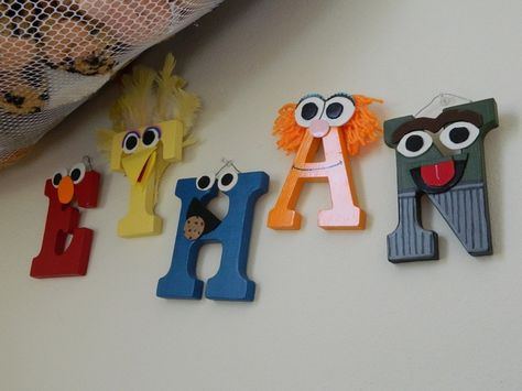 Custom-Made Wooden Nursery Letters - Sesame Street Characters seen here. $11.50, via Elmo Nursery, Sesame Street Room, Sesame Street Bedroom, Explorer Room, Elmo Decorations, Sesame Street Letters, Sesame Street Centerpiece, Character Alphabet, Street Room