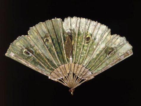 Luna moth fan American, about 1890 Painted by George Keiswetter, American (born in Germany), worked mid-19th century For Allen Fan Company, American, 1885–1910 East Braintree, Massachusetts, United States DIMENSIONS Guard: 37 cm (14 9/16 in.); maximum open: 66 cm (26 in.); arc: 160° MEDIUM OR TECHNIQUE Carved and painted wood sticks and silk plain-weave leaf painted in oil with applied metal sequins, thread, and net CLASSIFICATION Costumes ACCESSION NUMBER 1976.369 Folding Fans, Antique Fans, Museum Of Fine Arts Boston, Vintage Fans, Luna Moth, Hand Fans, Wood Sticks, Folding Fan, Hand Held Fan