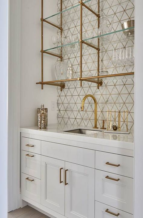 Ethereal Flicker Calacatta (H) w/ Brass | Products | AKDO Tile Dealers Brass Backsplash Dry Bar, Calcutta Gold Tile Backsplash, Glass And Gold Bar Shelves, Brass And Glass Bar Shelves, Wet Bar Backsplash, Brass Glass Shelves Bathroom, Akdo Tile, Bar Backsplash, Wet Bar Designs