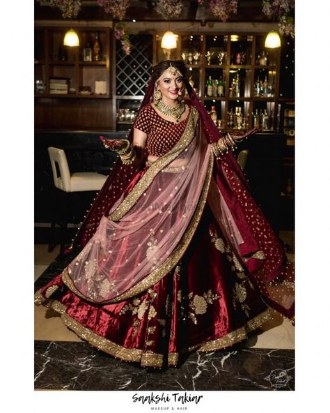 Photo of A bride in maroon lehenga and double dupatta twirling Lehenga With Double Dupatta, Maroon Bridal Lehenga, Double Dupatta, Maroon Lehenga, Latest Bridal Lehenga Designs, Bridal Lehenga Designs, Lehenga Jewellery, Latest Bridal Lehenga, Shimmery Dress