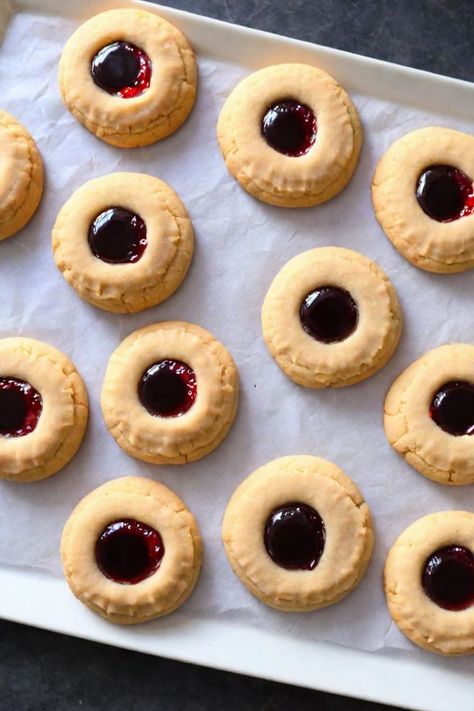 Thumbprint Cookies Recipe

Ingredients

- 1 cup (2 sticks) unsalted butter, softened
- 2/3 cup sugar
- 1 teaspoon vanilla extract
- 2 cups all-purpose flour
- 1/4 teaspoon salt
- 1/2 cup jam or preserves (any flavor you prefer)
- Chopped nuts for coating (optional) 

Full Cooking Instructions on... Thumbprint Cookie Recipe, Rosemary Chicken Recipe, Pie Brownies, Thumbprint Cookies Recipe, Fruit Filling, Thumbprint Cookies, Apricot Jam, Recipe Ingredients, Recipe Steps