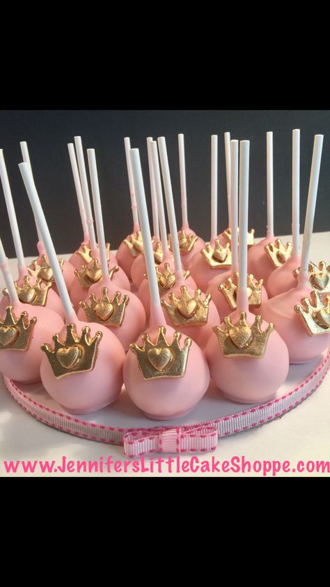 Princess cake pops in pink with gold crown from Jennifer's Little Cake Shoppe in Fleming Island, Florida- www.JennifersLittleCakeShoppe.com Royal Princess Cake Ideas, Royal Princess Birthday Theme, Princess Theme Desserts, Royal Princess Birthday Cake, Princess Birthday Treats, Crown Birthday Theme, Royal Princess Birthday Party Decoration, Disney Princess Cake Pops, Princess Cake Pops Ideas