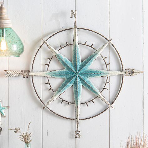 PRICES MAY VARY. 60 Day No Hassle Returns A Bella Coastal Decor Exclusive - Nautical metal wall art with a compass design and distressed blue finish. 36 3/4"W x 1 1/3"D x 33 3/5"H. Nautical Metal Wall Art, Compass Wall Art, Anchor Wall Art, Beach Wall Hanging, Metal Fish Wall Art, Seaside Home Decor, Black Forest Decor, Beach Canvas Wall Art, Nautical Compass