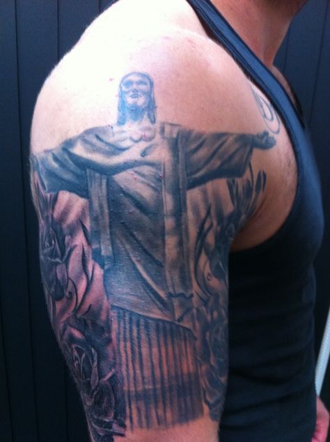 Christ the redeemer tattoo Redeemer Tattoo, Christ The Redeemer Tattoo, Bone Tattoos, Upper Arm Tattoos, Christ The Redeemer, Different Tattoos, Arm Tattoos For Women, Tattoo Parlors, Upper Arms