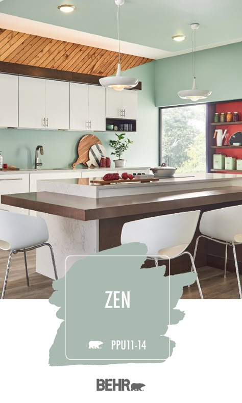 Modern architecture and a playful color palette give this kitchen a bold interior design style. And it’s all thanks to Behr Paint in Zen. This light pastel shade of green pairs beautifully with the bright pops of red, warm wood tones, and neutral white accents in this space. Click below for full color details. Bright Colored Office Space, Behr Pastel Paint Colors, Bright Kitchen Paint Colors, Behr Zen Paint, Zen Behr Paint, Zen Paint Colors, Behr Green Paint Colors, Pastel Green Paint, Playful Color Palette