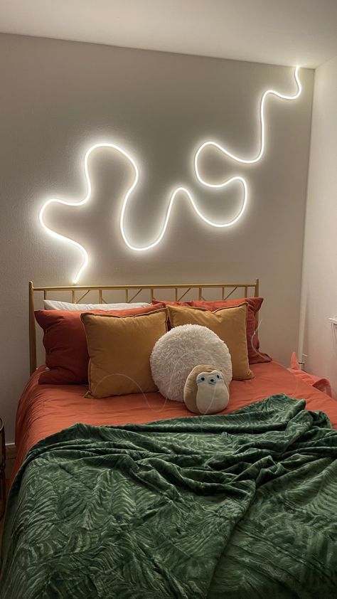 bobo bedroom, orange, gold, forest green Wallpaper Ideas For Apartment, Led Rooms Bedrooms, Light Up Bedroom Ideas, Lights For Wall Art, Led Lights Interior Design, Wiggly Led Lights, Retro Boho Room Ideas, Led Light Up Signs, Bendy Led Lights