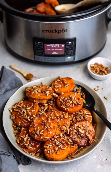 @crockpot candied sweet potatoes with bourbon, maple syrup and pecans Bourbon Maple Sweet Potatoes, Crockpot Thanksgiving Sweet Potatoes, Sweet Potato’s In Crockpot, Bourbon Yams Recipe, Candied Sweet Potato Recipes Crockpot, Candied Yams With Maple Syrup, Candied Sweet Potatoes In Crock Pot, Crock Pot Candied Sweet Potatoes, Crock Pot Sweet Potato Recipes