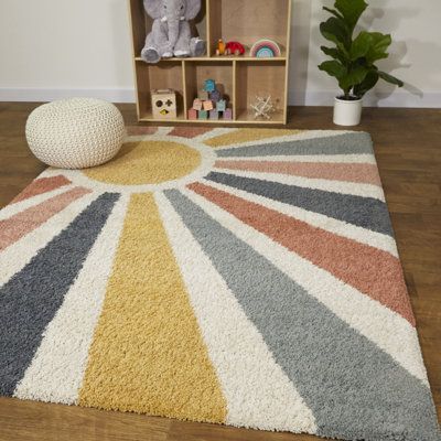 This unique collection of stunningly soft and cozy high-pile indoor rugs features a wide range of well-balanced designs; from modern organic lines, mid-century geometric shapes, and on-trend playful patterns to tribal-inspired drawings and primitive symbolic motifs... there's a rug to match every kind of interior design. Thanks to the high-quality, micro-set polypropylene yarn and the durable woven construction, these rugs are stain resistant, non-shedding, suitable for floor heating, and very e You Are My Sunshine Nursery Decor, Sunshine Nursery Theme Gender Neutral, Terra Cotta Nursery, Sun Themed Nursery, Sunshine Themed Nursery, Muted Rainbow Nursery, Orange Playroom, Sunny Nursery, Rainbow Boys Room