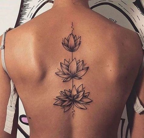 Lotus Flower Spine Tattoo - Cute, Colored, Black and White, Large and Small Lotus Tattoos. Ankle, Wrist, Back, Forearm Tattoos. #tattoos #tattooideas #lotustattoo #lotusflower #tattoosforwomen #backtattoo Simple Lotus Flower Tattoo, Tato Mandala, 27 Tattoo, Lotusblume Tattoo, Flower Spine Tattoos, Lotus Flower Tattoo Design, Tato Minimal, Flower Tattoo Back, Spine Tattoos For Women