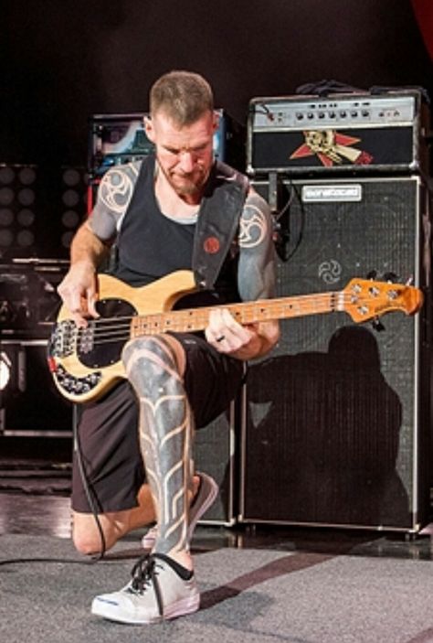 Tim Commerford Barefaced cabs Tim Commerford Tattoo, Tim Commerford, Playing Musical Instruments, Artwork Tattoo, Peter Steele, Bass Guitarist, Band Outfits, Leg Sleeve Tattoo, Rage Against The Machine